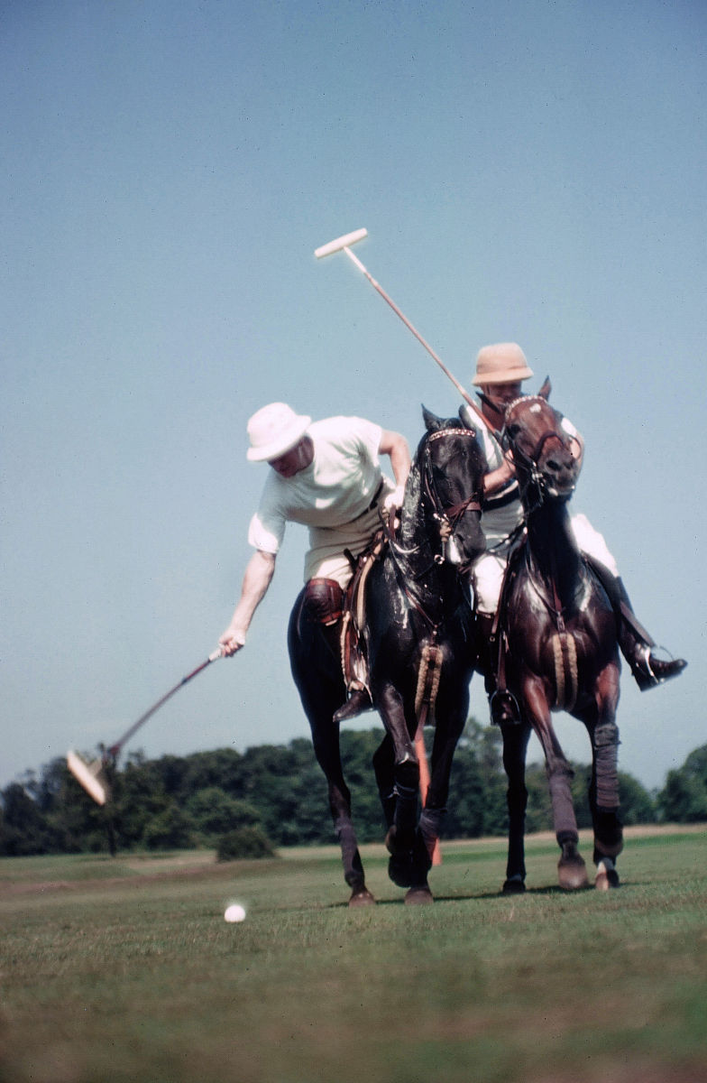 unionville,pa - circa 1958: a view as riders play polo at the po