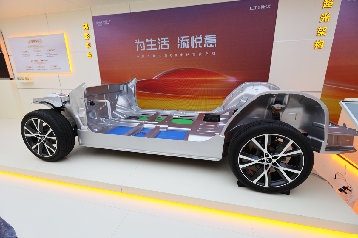 Please help me write a 4000 word essay on PEST analysis of the reasons for Tesla to build a factory in Shanghai for new energy vehicles