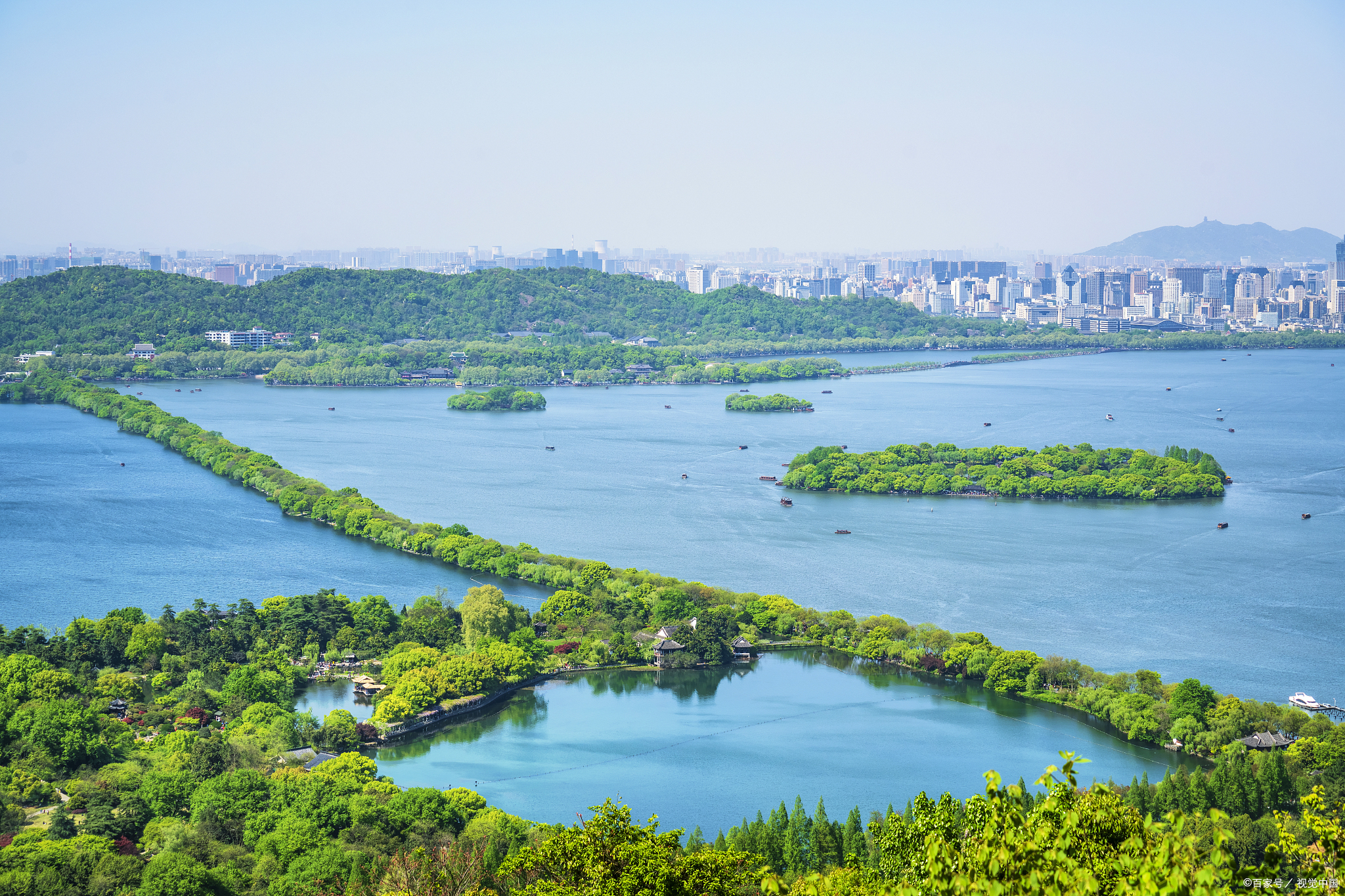 【萧山探秘:湘湖碧波轻拂,跨湖桥古韵悠长,杭州乐园欢聚时光】