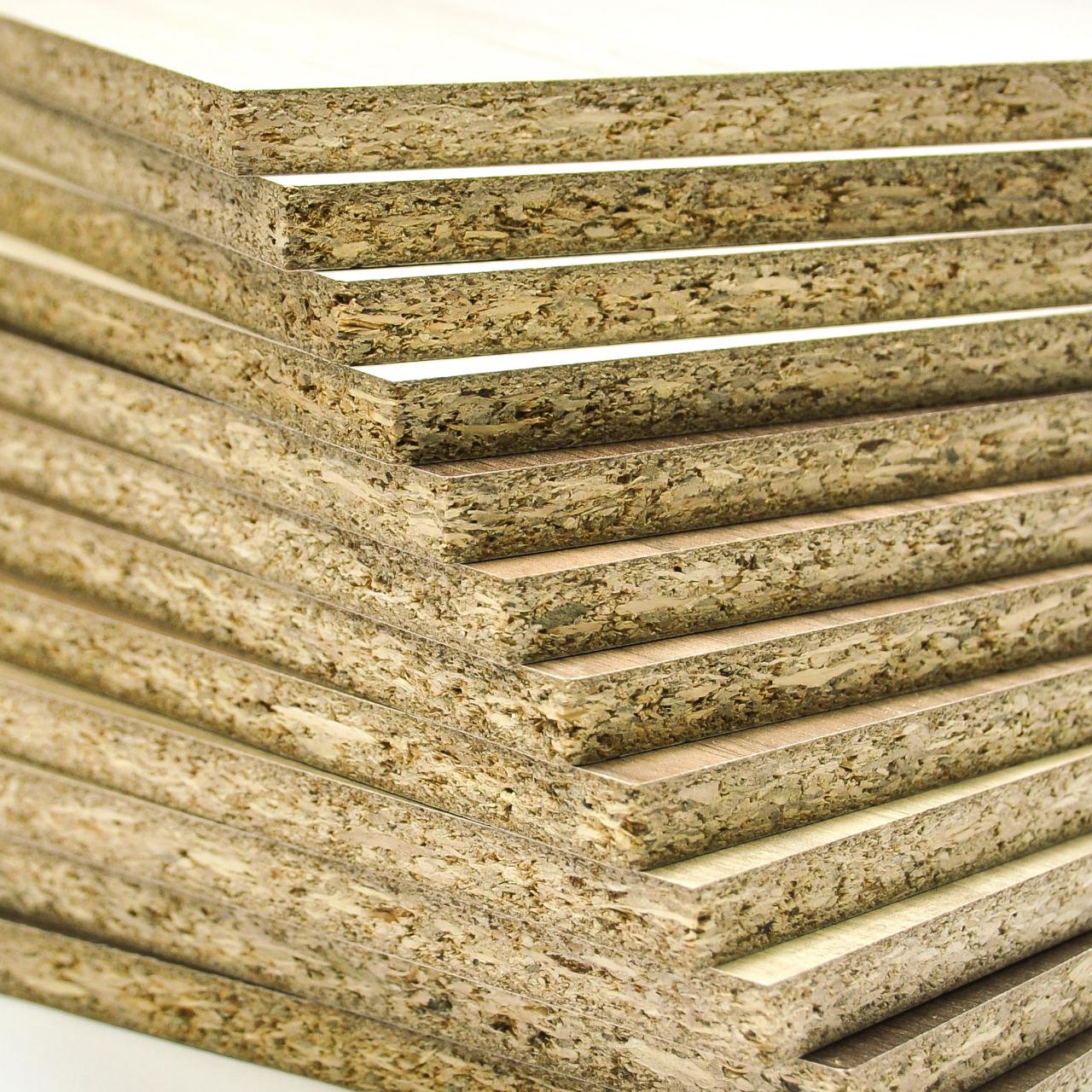 实木颗粒板   实木颗粒板是由木材或其他木质纤维素材料制成的碎料,经