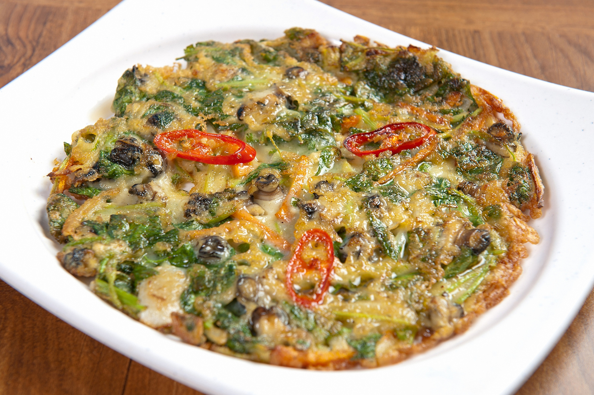 闽南小吃,海蛎煎,主要食材地瓜粉,海蛎和葱花.