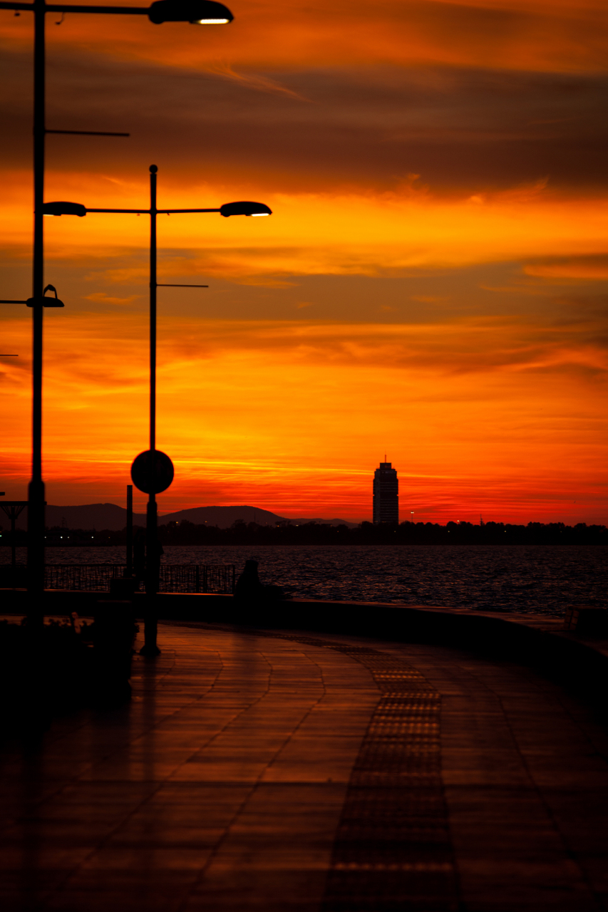 如何抓拍城市上空的夕阳,特别是怎么拍摄更清晰?