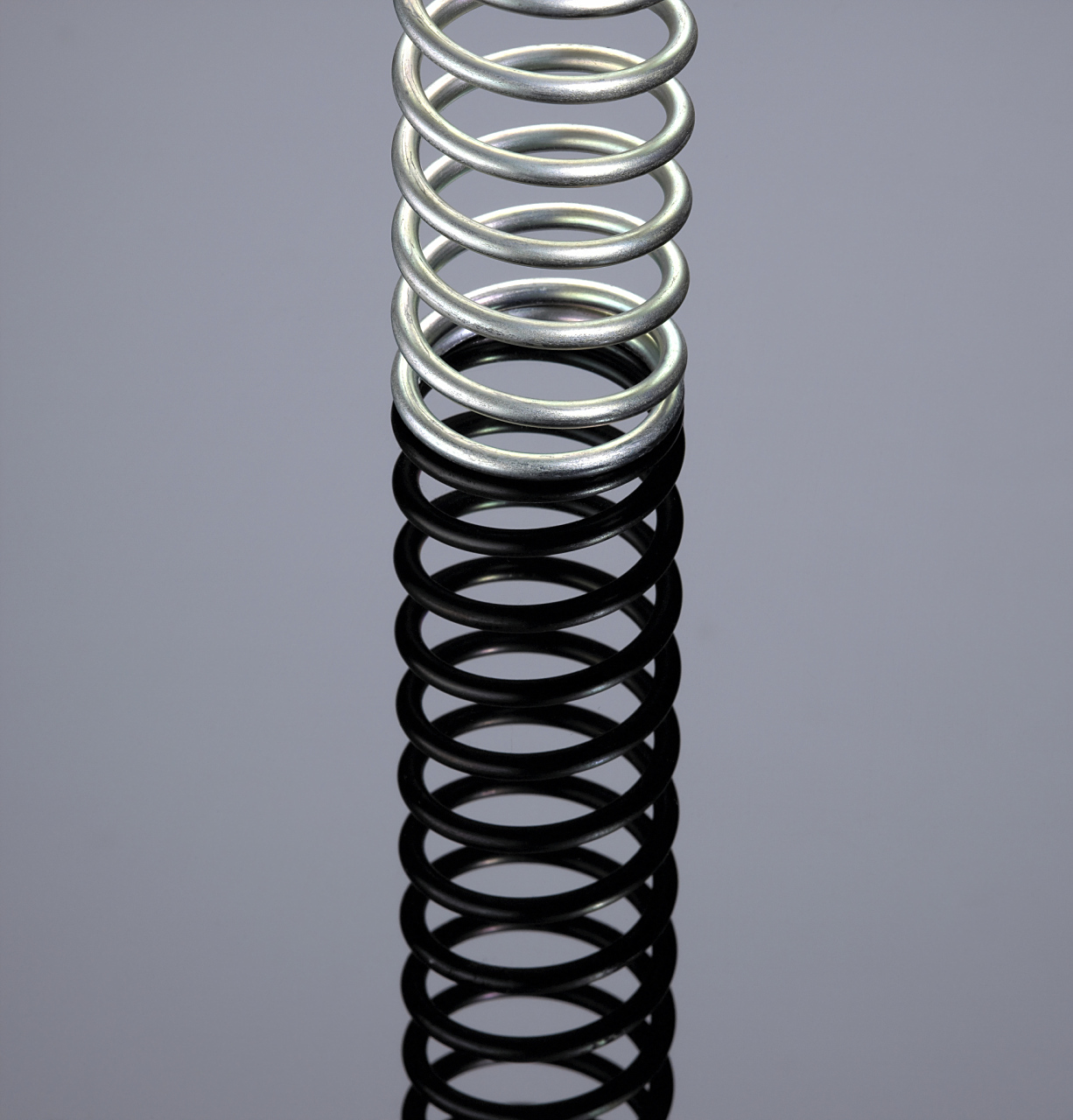 为确保长期稳定运行,需选择合适的弹簧类型和规格,并进行适当维护和