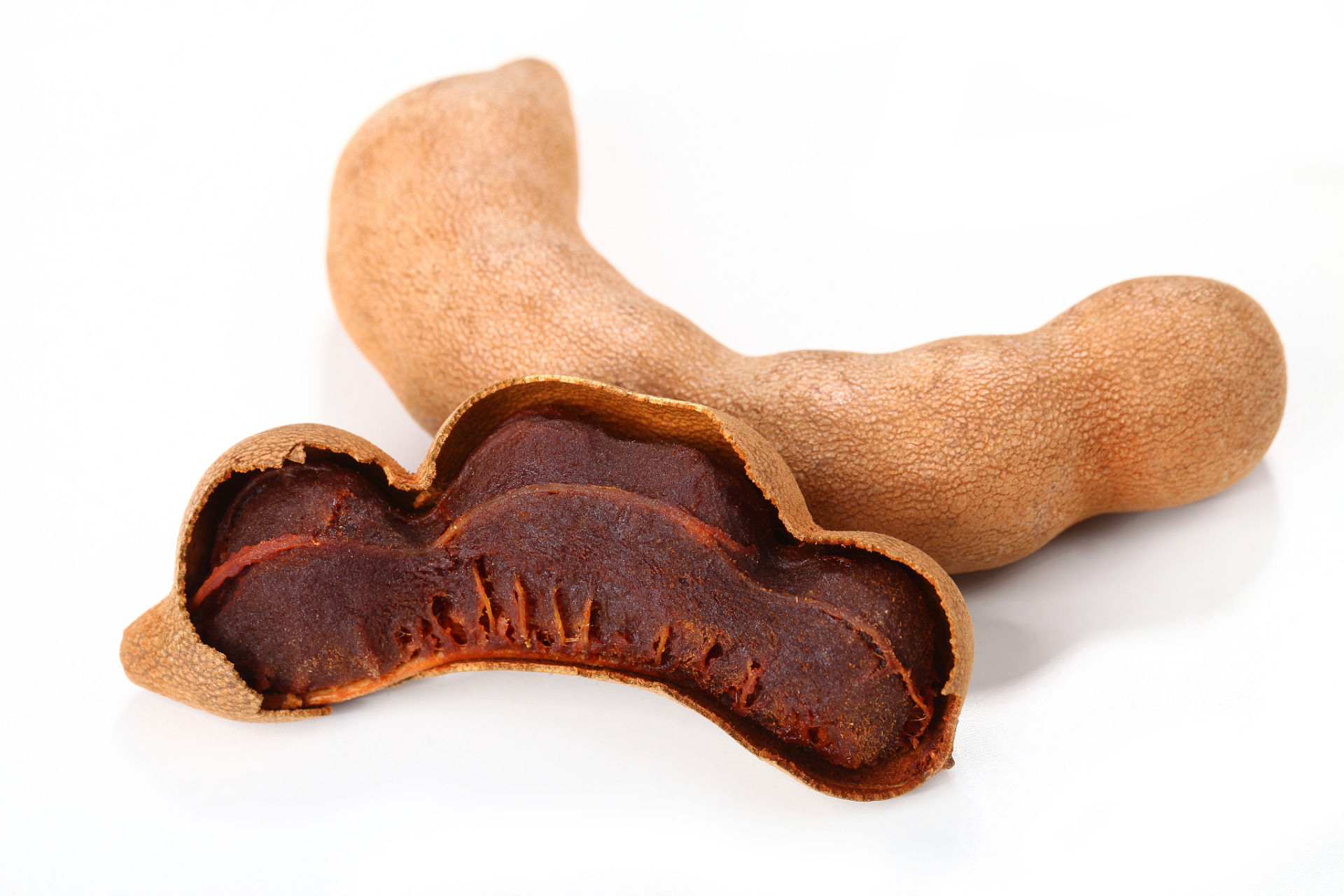 形似弯钩,表壳如树皮,长得像干毛豆的酸角,也叫罗望子