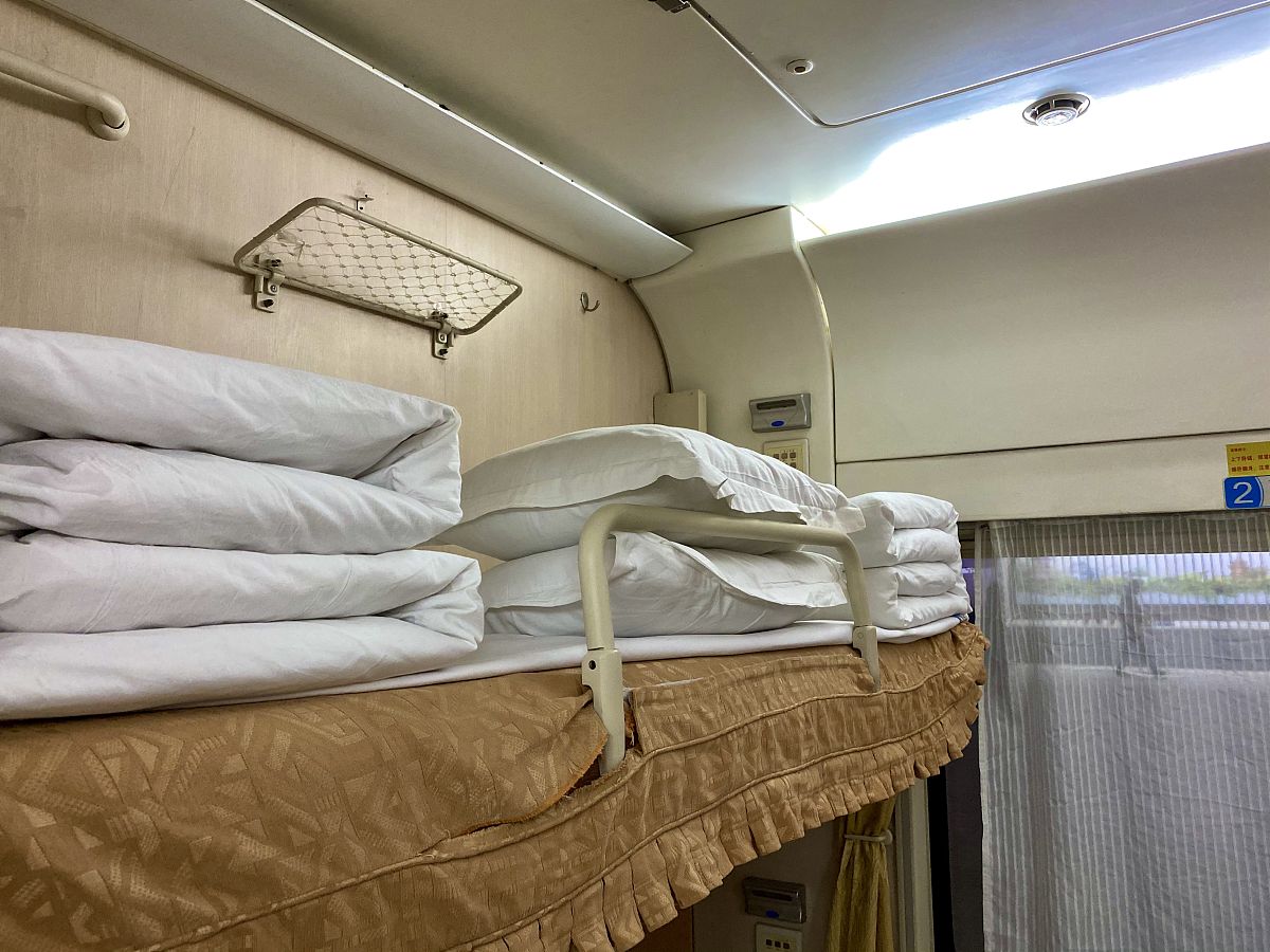 天津到哈尔滨软卧车厢图片及价格重庆到哈尔滨火车软卧图