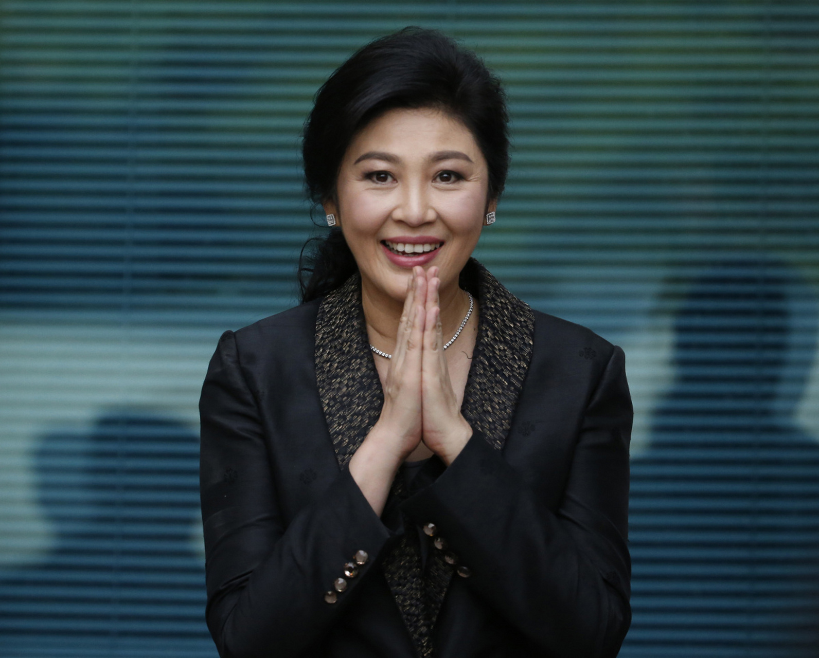 泰国前女总理英拉·西那瓦:回归政坛的未知之路  自2017年逃离泰国