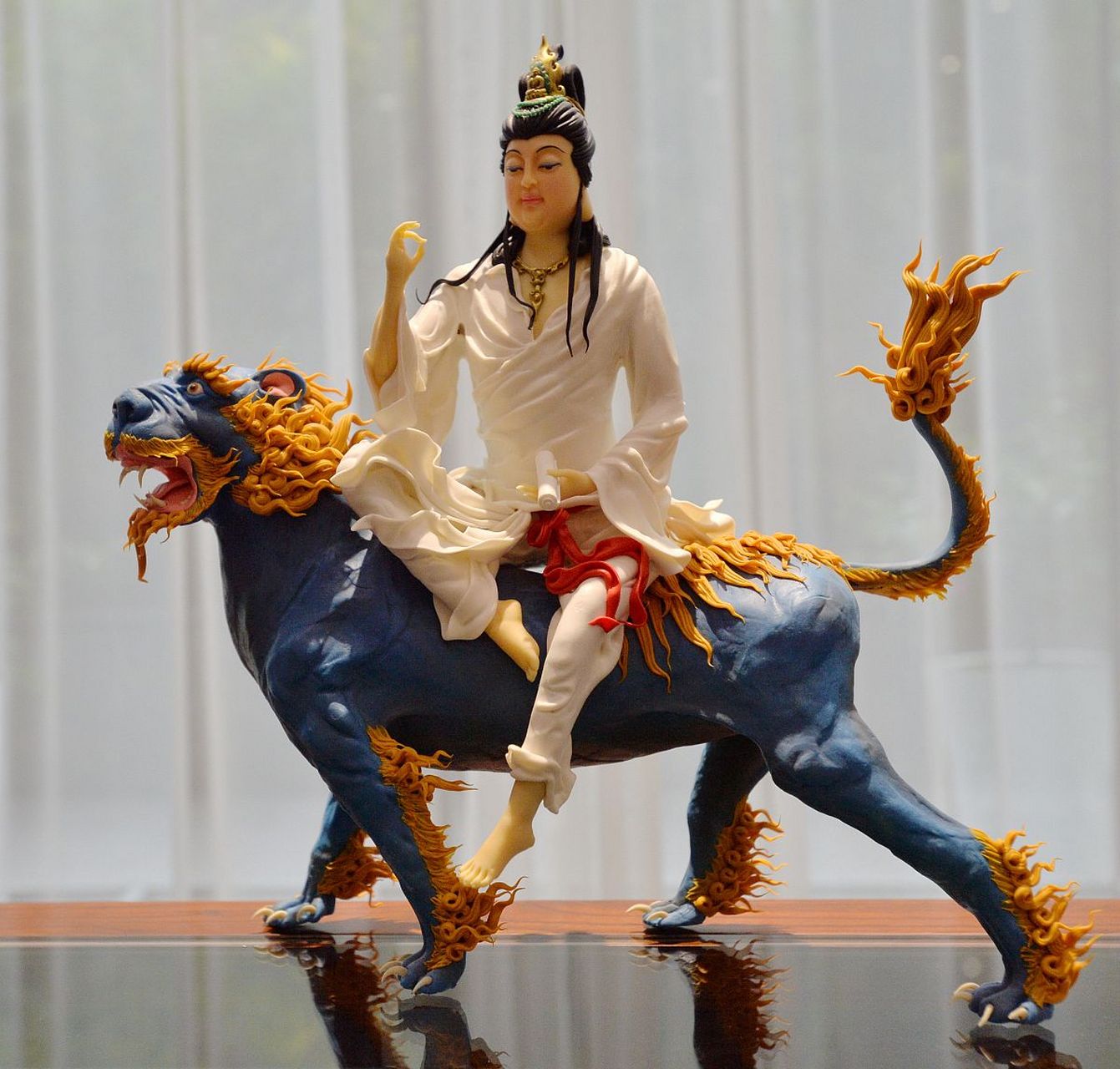 观音坐骑金毛犼  犼,是我国古代的一种神奇猛兽,极